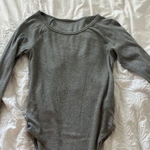 grey long sleeve body suit